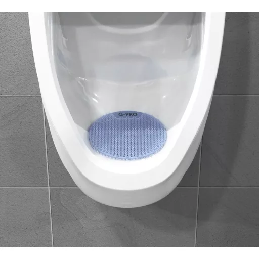 Kerek forma, sörtékkel teli felület, hosszan tartó illat, ez a G-PRO piszoár rács.